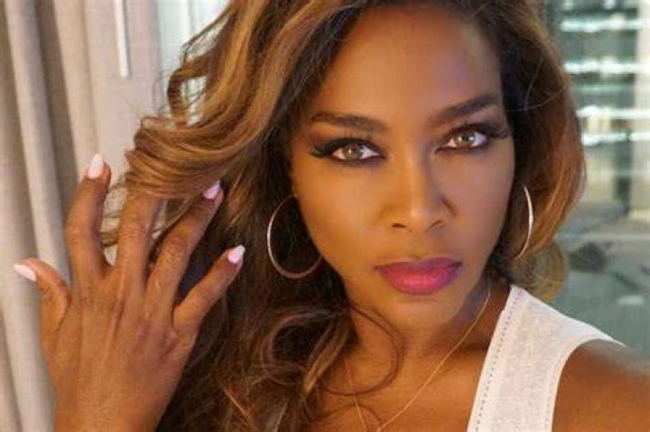Ashanti Dances In Tiny Bathing Suit Under The Shower While Singing ‘Rain On Me’ In Viral Video