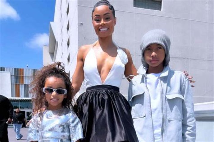 Blac Chyna Flaunts Her Curves By The Pool With Her Son, King Cairo Who’s Tyga’s Twin In A Photo: ‘I Got A Real King On My Side’ – See The Pics