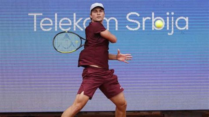 How many titles has Miomir Kecmanović won? What is Miomir Kecmanović rank?