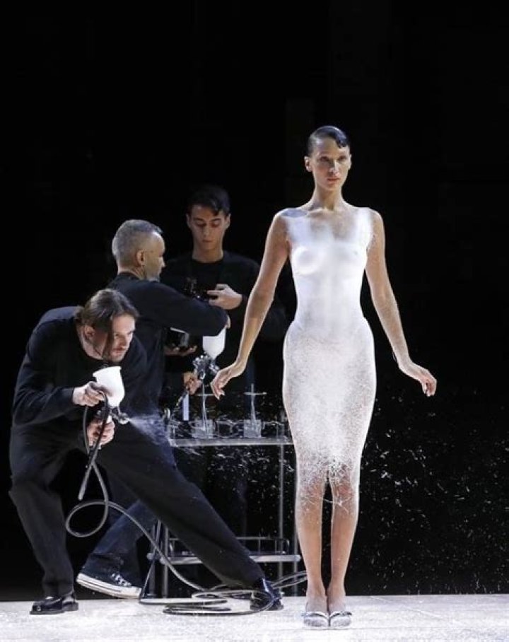 In The Middle Of The Runway Show, Bella Hadid’s Outfit Was Spray Painted