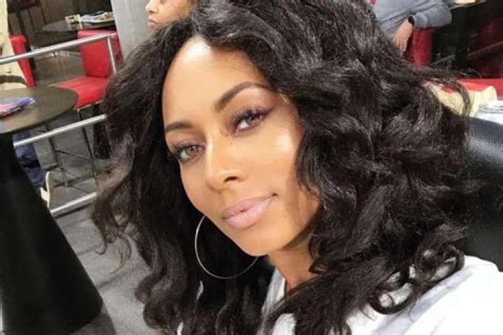 Keri Hilson Posts Alluring Photo In Skin-Colored Bathing Suit And Is Automatically Compared To Beyoncé; Drama Ensues