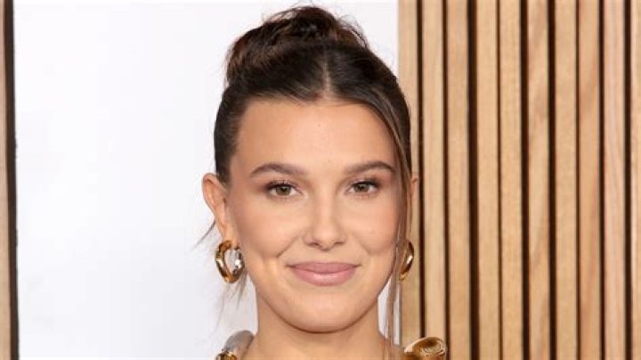 Millie Bobby Brown Shares Swimsuit Photo Saying "Santa Tell Me"
