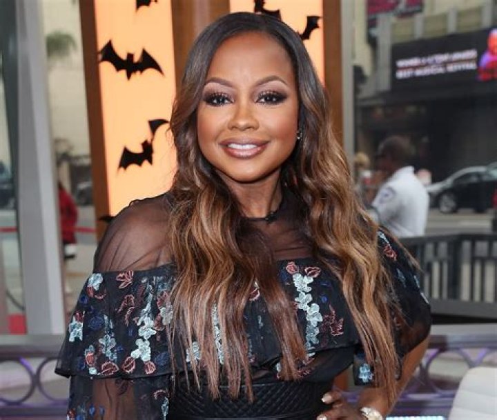 Phaedra Parks Gives Them Something To Talk About In Stunning Valentine’s Day Dress Photo — Will Tone Kapone Resist?