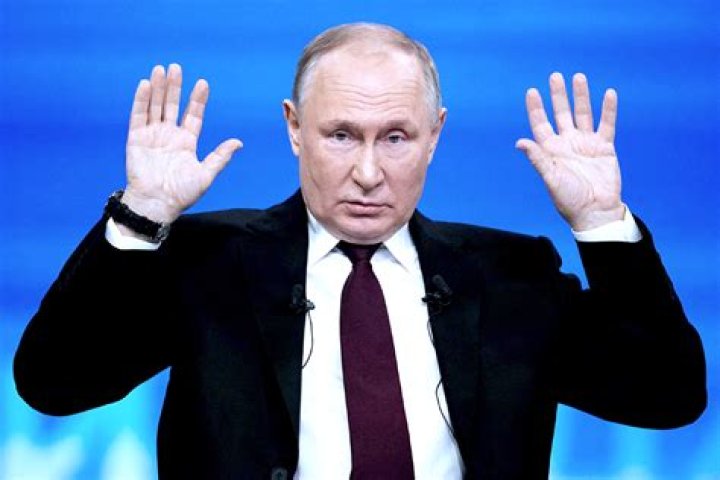 What happened to Vladimir Putin’s right arm? Parkinson’s disease or KGB training?