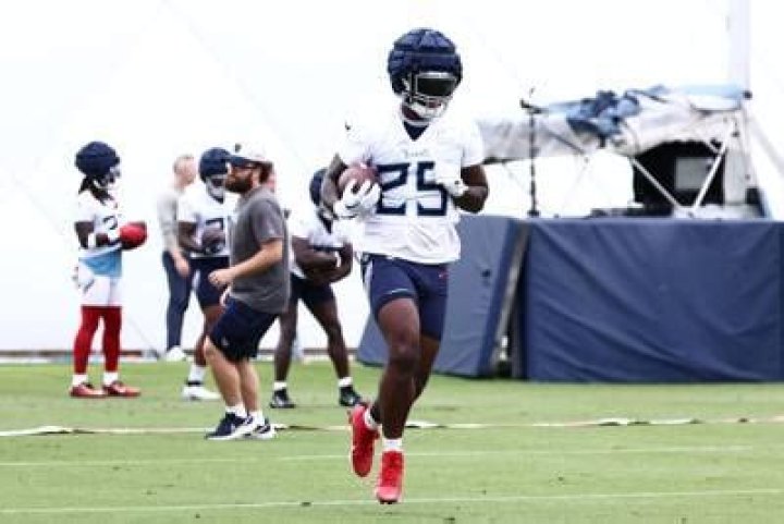 Where did Hassan Haskins go to college? Did Hassan Haskins play college football?