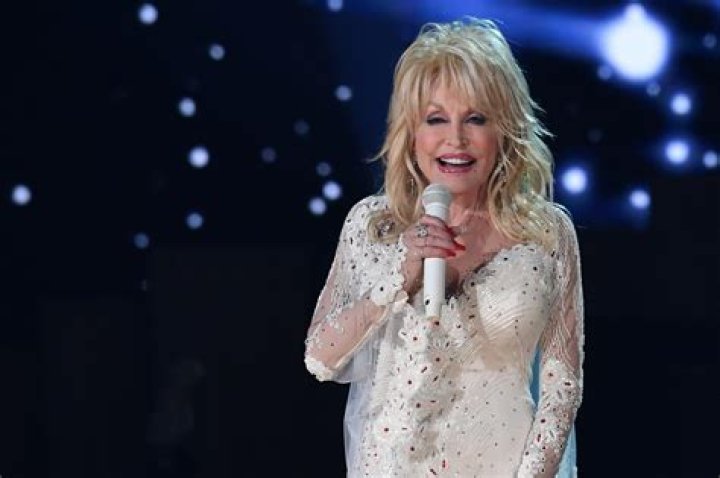 Why does Dolly Parton always wear long sleeves?